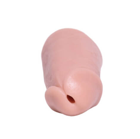 The tip of the 001 skin tone of the PeenPocket pleasure sleeve for transgender men.