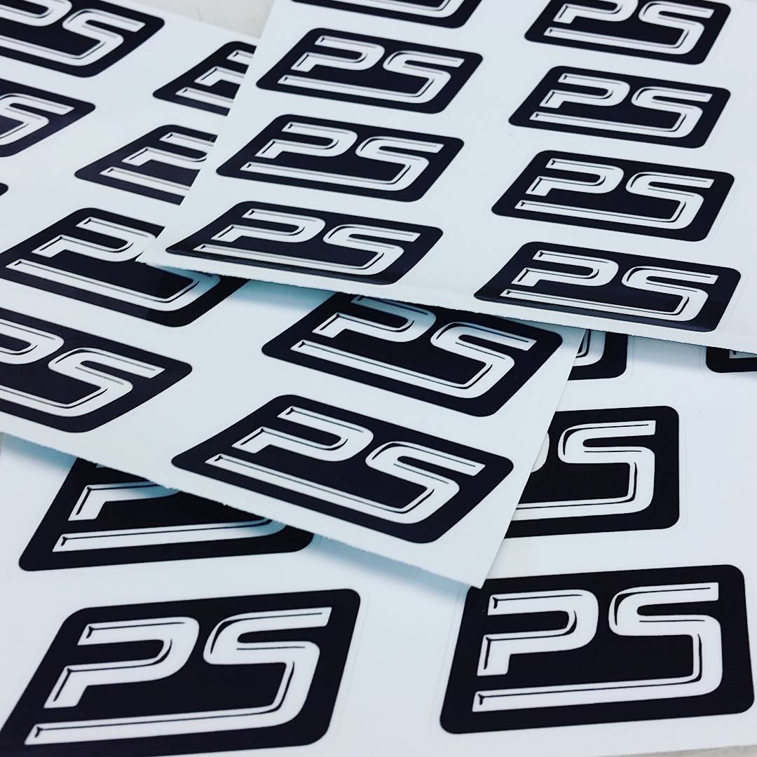 A pile of FTM Pitstop stickers.