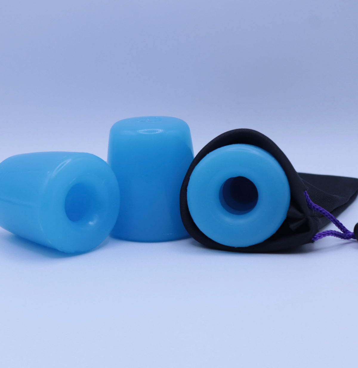 Three of the ShotPocket pleasure sleeve in a row.