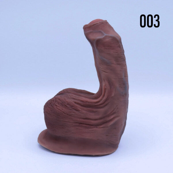 Left side of the 001 Painted Uncut Jimmy STP stand to pee packer for trans men.